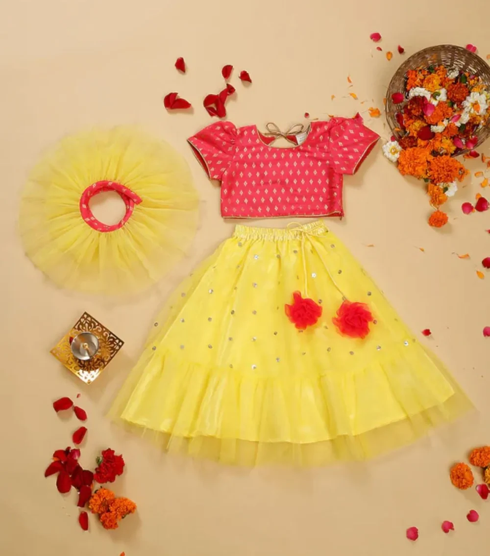 Rosy light red and yellow Lehenga choli with frilly dupatta